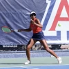 Tanvi Narendran hitting a tennis ball